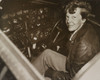 Amelia Earhart Sitting In The Cockpit Of Her Lockheed Electra Airplane History - Item # VAREVCHISL035EC860