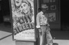 Mexican Man In Front Of A Movie Theater Playing City Streets History - Item # VAREVCHCDLCGAEC301
