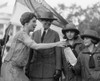 First Lady Grace Coolidge Enthusiastically Samples Girl Scout Cookies. October 17 History - Item # VAREVCHISL041EC026