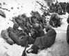 U.S. Marines Catch A Few Moments Rest During Their Withdrawal From The Chosin Reservoir. Dec. 6 History - Item # VAREVCHISL038EC334