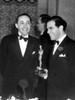 1935 Producer Irving Thalberg Receives The Oscar For Best Picture [Mutiny On The Bounty] From Director Frank Capra History - Item # VAREVCSBDOSPIEC039