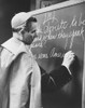 Bishop Fulton Sheen Writing On Blackboard During The Broadcast Of His Tv Show History - Item # VAREVCCSUB001CS792