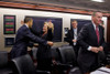 Hillary Clinton Joyfully Congratulates President Obama After House Of Representatives Voted To Pass Health Care Reform. The Vote Came In Just Prior To A Meeting In The Situation Room Of The White House. March 22 2010. - Item # VAREVCHISL026EC165