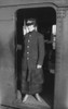 Uniformed Woman Brooklyn Subway Guard Stands In The Doorway Of Train Car. Ca. 1910. History - Item # VAREVCHISL022EC011