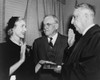 Clare Boothe Luce Being Sworn In As Ambassador To Italy By Chief Justice Fred M. Vinson As Secretary Of State John Foster Dulles Looks On. 1953. History - Item # VAREVCHISL004EC279