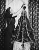 Deanna Durbin Decorating Her Two Dimensional Wartime Christmas Tree Still - Item # VAREVCPBDDEDUEC088