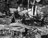 Aftermath Of Tet Offensive. Three Vietnamese Women Return To Their Homes In The Ruins In Of The Cholon Area Of Saigon After A Viet Cong Tet Offensive. January 31 History - Item # VAREVCHISL033EC321