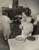 Women Cooking Spaghetti And Frying Chicken On An Old Stove For The Grape Festival. Tontitown History - Item # VAREVCHISL039EC443