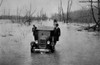 Automobiles On A Flooded Road Between Mounds And Cairo Illinois During The Great Mississippi Floods Of 1927. March 25 1927. History - Item # VAREVCHISL030EC011