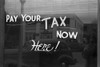 Sign Reading Pay Your Tax Now Here In Harlingen Texas Feb. 1939 Photo By Russell Lee. History - Item # VAREVCHISL024EC101
