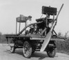 Man On Wheeled Vehicle With Mounted Propeller History - Item # VAREVCHISL043EC111