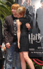 Rupert Grint, Emma Watson At The Induction Ceremony For Harry Potter Foot-Print And Wand-Print Ceremony, Grauman'S Chinese Theatre, Los Angeles, Ca, July 09, 2007. Photo By Dee CerconeEverett Collection Celebrity - Item # VAREVC0709JLCDX021