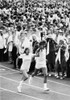Olympic Games, 1976. /Ntorch Bearers Sandra Henderson (Age 16) And Stephane Prefontaine (Age 15) On Their Way To Light The Olympic Flame At The Opening Ceremonies Of The Summer Olympic Games In Montreal, Quebec, Canada, 17 July 1976. Poster Print by