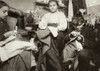 Hine: Home Industry, 1912. /Na Mother And Her Two Children Finishing Garments In A Tiny One Room Tenement Apartment At 214 Elizabeth Street In New York City. Photograph By Lewis Hine, December 1912. Poster Print by Granger Collection - Item # VARGRC0