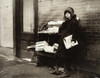 Hine: Newsgirl, 1912. /Na Ten-Year-Old Newsgirl Tending A Newstand On 4Th And Garden Streets In Hoboken, New Jersey. On The Right Is The Entrance To A Saloon. Photograph By Lewis Hine, December 1912. Poster Print by Granger Collection - Item # VARGRC