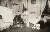Hine: Home Industry, 1912. /Na Mother And Her Three Young Children Working On Garter Buttons In The Bedroom Of A Tenement Home In Worcester, Massachusetts. Photograph By Lewis Hine, November 1912. Poster Print by Granger Collection - Item # VARGRC016