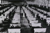 Spanish Flu Epidemic 1918-19. U.S. School Gymnasium Converted Into An Flu Ward With Patients' Beds Are Separated By Screens And Masked Health Workers. An Estimated 25 Of The Us Population Contracted The Flu And Over 500 History - Item # VAREVCHISL015
