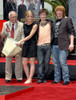 Emma Watson, Daniel Radcliffe, Rupert Grint At The Induction Ceremony For Harry Potter Foot-Print And Wand-Print Ceremony, Grauman'S Chinese Theatre, Los Angeles, Ca, July 09, 2007. Photo By Dee CerconeEverett Collection Celebrity ( x - Item # VAREVC