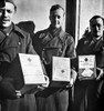 Prisoners Of War, C1942. /Nthree Belgian Officers At A German Prison Camp Known As Oflag Iia, Receiving Packages Of Food, Cigarettes And Other Supplies From The American Red Cross. Photograph, C1942. Poster Print by Granger Collection - Item # VARGRC
