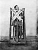 China: Punishment, C1870. /Na Criminal In China Being Punished By Confinement In A Cage, In Which He Can Relieve His Feet Only By Suspending Himself By The Neck, And Will Ultimately Die Of Starvation And Thirst. Photographed By John Thomson, C1870. P