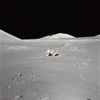 Apollo 17 Geologist-Astronaut Harrison H. Schmitt At The Taurus-Littrow Landing Site. Shorty Crater Is To The Right. The Peak In The Center Background Is Family Mountain. A Portion Of South Massif Is On The Horizon At The Left Edge. - Item # VAREVCHI