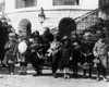 White House: Easter, 1923. /Nwhite House Police Officer Edgar Porter Watching A Group Of Children Who Got Lost Or Strayed From Their Parents During The Annual Easter Egg Roll On The White House Lawn In Washington, D.C., 2 April 1923. Poster Print by