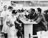 Lunch Counter Sit-In, 1960. /Nlunch Counter Employees At A Peoples Drug Store In Arlington, Virginia, Preparing To Close Early While Black And White Customers Stage A Sit-In Demonstration, 9 June 1960. Poster Print by Granger Collection - Item # VARG