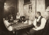 Hine: Home Industry, 1911. /Na Family Making Willow Plumes From Feathers, As The Unemployed Truck-Driver Father Observes The Work In An Unsanitary Tenement Apartment At 309 East 110Th Street In New York City. Photograph By Lewis Hine, December 1911.