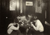 Hine: Home Industry, 1912. /Na Mother And Her Four Sons Setting Stones In Cheap Jewelry At Their Kitchen Table In Their Home In Attleboro, Massachusetts. Photograph By Lewis Wickes Hine, November 1912. Poster Print by Granger Collection - Item # VARG