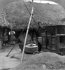 China: Mill, C1908. /Na Chinese Man Standing Next To A Threshing Machine, With A Pile Of Grain In The Foreground And Two Women And A Thatched-Roof Building In The Background, Hangchow, China, C1908. Poster Print by Granger Collection - Item # VARGRC0