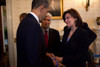 Vicki Kennedy Wife Of The Late Sen. Edward Kennedy At The Signing Ceremony For The Health Insurance Reform Bill March 23 2010. She Gives President Obama A 'Tedstrong' Bracelet Which Shows Support For Cancer Advocacy. March 23 2010. - Item # VAREVCHIS