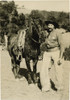 Movie Cowboy, Circa 1921. . Identified On Verso As "Bob, Riding For Movies," A Man In Woolies Standing Next To His Very Tired And Sweaty Horse. Hills And Trees In Background - Most Likely A Southern California Location. Poster Print - Item # VARBLL05