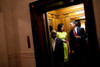 A Smiling President Obama Holds A Tortilla From The White House Cinco De Mayo Celebration In The Elevator To The Private Residence On May 4 2009. Michelle Wears An Acid Green Satin Dress From Mocshino'S 2009 SpringSummer Collection. - Item # VAREVCHI A Smiling President Obama Holds A Tortilla From The White House Cinco De Mayo Celebration In The Elevator To The Private Residence On May 4 2009. Michelle Wears An Acid Green Satin Dress From Mocshino'S 2009 SpringSummer Collection. - Item # VAREVCHI