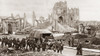 World War I: Prisoners. /Ngerman Prisoners-Of-War Marching Through The City Of Ypres After The Battle Of The Menin Road, The Ruins Of The Cloth Hall Are In The Background. Photograph, September 1917. Poster Print by Granger Collection - Item # VARGRC