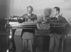 Henry Ford (1863-1947)./Namerican Automobile Manufacturer. With His Son Edsel In Front Of The First Lathe Which Was Used In Making Ford Parts In 1894 In A Small Workshop In Detroit: Photographed At Madison Square Garden, New York, September 1928. Pos