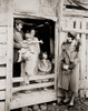 A Family Of Poor Sharecroppers At Their Arkansas Farm Home Welcome A Red Cross Worker During The Great Drought Of 1930-31. There Is A Striking Contrast In The Clothing And Style Of The Urban Red Cross Worker And The Rural Family. - Item # VAREVCHISL0