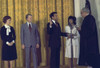 Supreme Court Justice Thurgood Marshall Swears In Former Georgia Representative Andrew Young As The First African American To Serve As United States Ambassador To The United Nations As President And Rosalynn Carter Watch. Jan. 30 1977 - Item # VAREVC