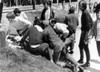 Kent State University Students Come To The Aid Of A Wounded Youth. He Was One Of 4 Students Killed And 9 Wounded When National Guardsmen Fired 67 Rounds In 13 Seconds Into A Crowd Of 500 Anti-Vietnam War Protesters. May 4 History ( x - Item # VAREVCC