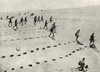 The Desert Phase Of The South-West African Campaign. Union Troops Plodding Forward Under Fire. The Man Lower Right Has Been Hit. Puffs Of Sand From Bullets Can Be Seen. From The Great World War A History Volume Iii, Published 1916. PosterPrint - Item