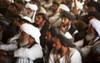 Afghan Farmers At A Shura Lead By Nawa District Governor Haji Abdul Manaf In The Helmand Province. Hundreds Of Farmers Were Told About The Food Program Which Provided Farmers With An Alternative Crop To The Poppy. Oct. 17 2010. - Item # VAREVCHISL024