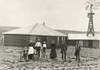 Nebraska: Settlers, C1885. /Nfamily Of Homesteaders, Photographed Outside Of Their Sod House With A Windmill On The Roof Of The Adjoining Building In Custer County, Nebraska. Photograph By Solomon D. Butcher, C1885. Poster Print by Granger Collection