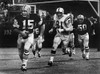 Football Game, 1966. /Nquarterback Bart Starr Of The Green Bay Packers Attempting To Run For A First Down Against The Baltimore Colts After Failing To Find An Open Receiver, During A Game At County Stadium, Milwaukee, Wisconsin, 10 September 1966. Po