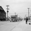 Detroit, 1942. /Nmoving Vans, With A Police Escort, Moving Black Families' Belongings Into The Newly Built Sojourner Truth Housing Project In Detroit, Michigan. Photograph By Arthur Siegel, February 1942. Poster Print by Granger Collection - Item # V