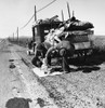 Drought Refugees, 1937. /Na Destitute Missouri Family Of Five With No Money, A Sick Baby, And A Broken Down Automobile Alongside U.S. Highway 99 In San Joaquin County, California. Photograph By Dorothea Lange, February 1937. Poster Print by Granger C