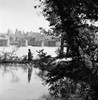 Civil War: Richmond, 1865. /Nan African American Man Walking Along The James River With A View Of The Burned District And Ruins Of Mayo'S Bridge In The Background Of Richmond, Virginia Following The American Civil War. Photograph, April 1865. Poster