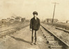 Hine: Child Labor, 1908. /Na Young Worker Walking Along The Train Tracks To Maple Mills, Where The Boy Had Been Employed For Two Years In Dillon, South Carolina. Photograph By Lewis Hine, December 1908. Poster Print by Granger Collection - Item # VAR