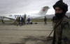 In Afghanistan A Northern Alliance Soldier Provides Security To The Mazir-E Sharif Civilian Airfield During The Landing Of A Red Cross Aircraft Dec. 11 2001. The Taliban Were Driven From Mazir-E Sharif On Nov. 10 2001 Afghan General - Item # VAREVCHI