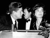 President John Kennedy And Wife Jacqueline Attend The Washington International Horse Show. Mrs. Kennedy Presented The President'S Perpetual Championship Cup To The Winning Jumper At The Show. In Background Is Gore Vidal History - Item # VAREVCCSUA001