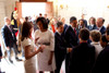 President Obama And French President Sarkozy Greet Delegates As Michelle Obama And Carla Bruni-Sarkozy Chat In Caen France On June 6 2009. Bruni Wears A Dior Dress And First Lady Wears A Narciso Rodriguez Dress With Matching Belted - Item # VAREVCHIS