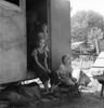 Farm Family, 1939. /Nthe Oldest Girl Seated In The Doorway Of The House Trailer Cares For Her Sisters While Her Parents Are Working On The Farm, Yakima Valley, Washington State. Photograph By Dorothea Lange, August 1939. Poster Print by Granger Colle